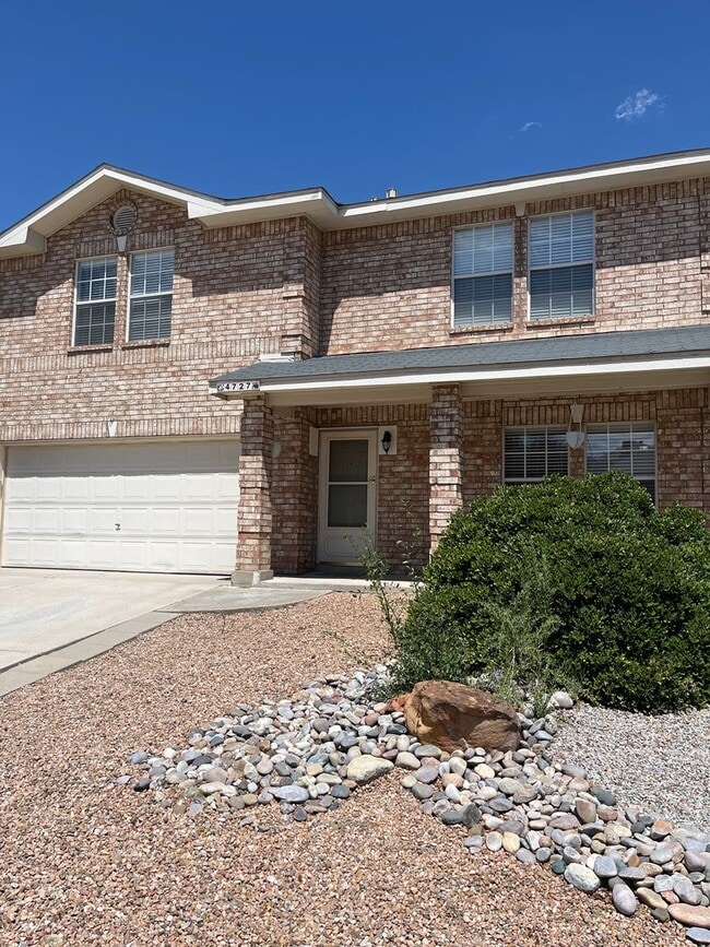 Building Photo - Fully landscaped 4 br home