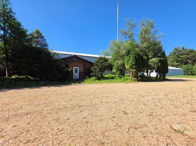 24.2 Acres – Industrial Warehouse, Residential Or Office Space, Pole Shed & Recreational Land