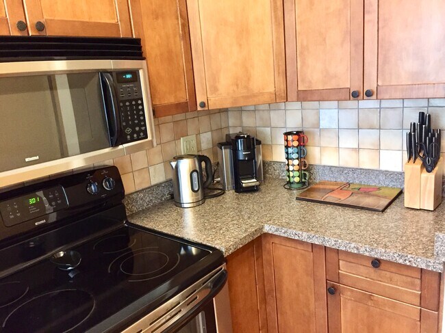 microwave with fully equipped kitchen - 116 St Paul St Unit Loft C