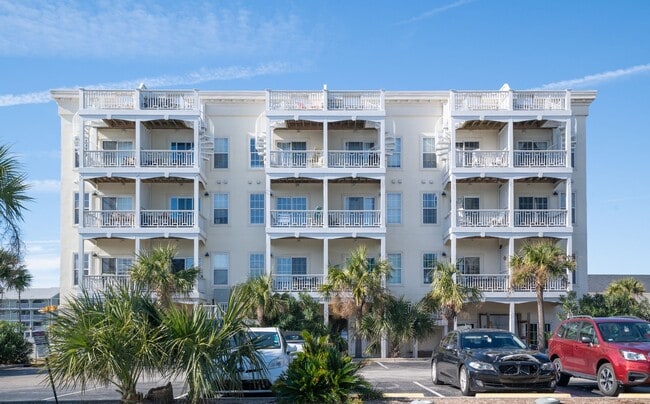 Building Photo - ENJOY OCEAN BREEZES FROM THIS FURNISHED OF... Unit 106 Rental