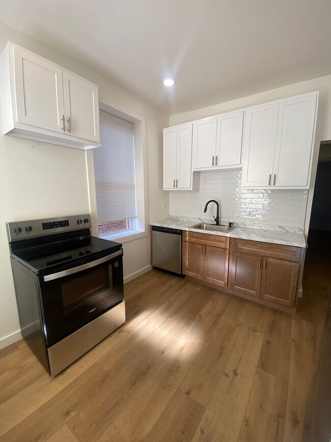 Building Photo - 4716 Louisiana Ave Unit 1F