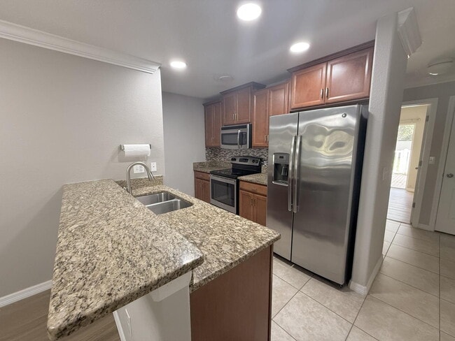 Photo - "Charming 3-Bed, 3-Bath Townhouse Retreat in Trinity, FL – 1501 Sq. Ft. of Comfort and Style!"