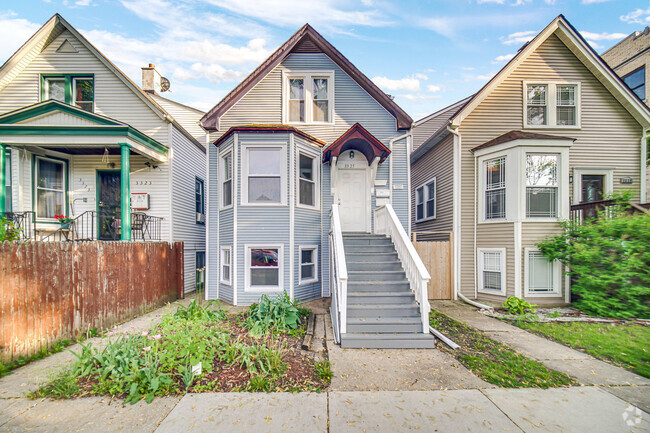 Building Photo - 3325 W Berteau Ave Unit 1 Rental