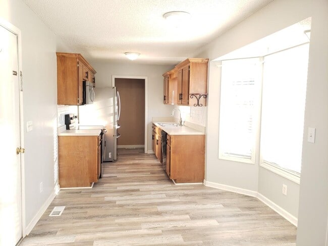 Photo - Close to Post! No Carpet! Lovely 3 Bed/2 Bath fenced in backyard!