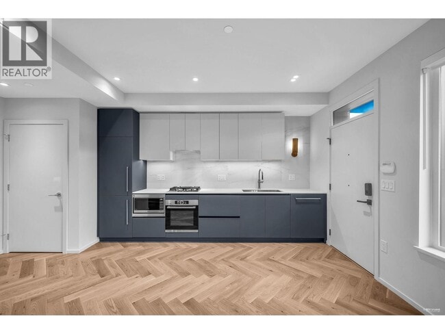 Photo - 775 W 49th Ave Unité 1xx