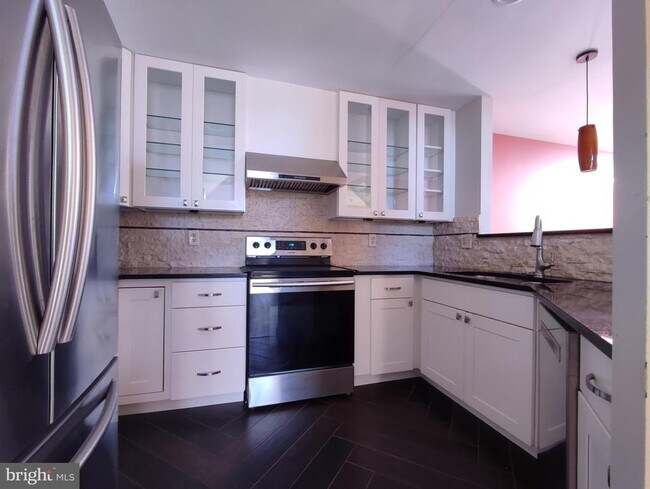 Photo - 7671 Coachlight Ln Townhome