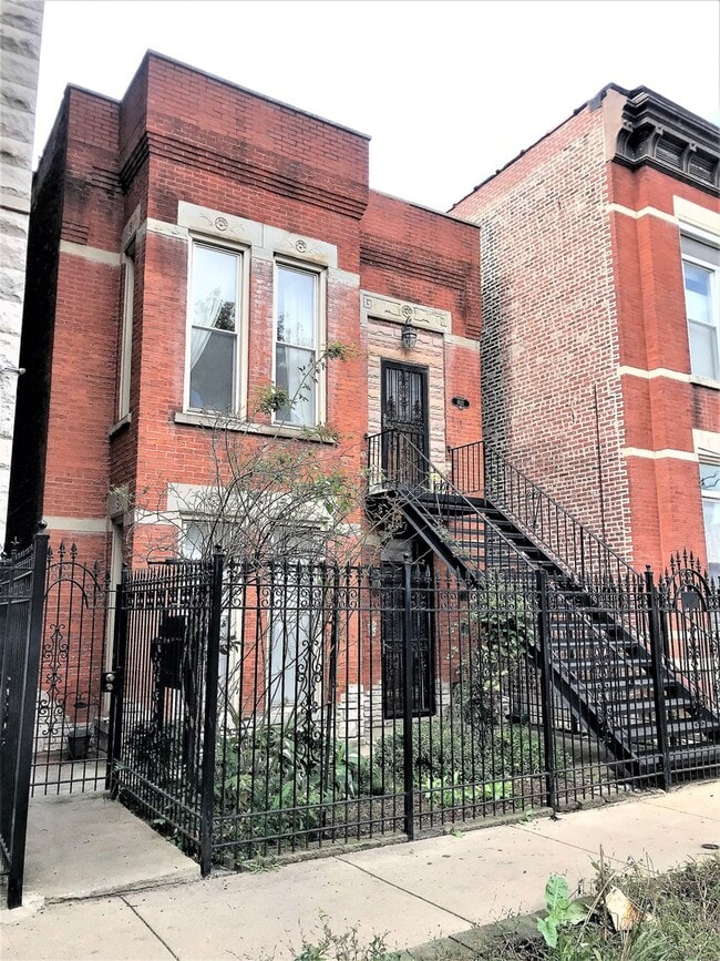 Building Photo - 1012 S Oakley Blvd Unit 1 Rental