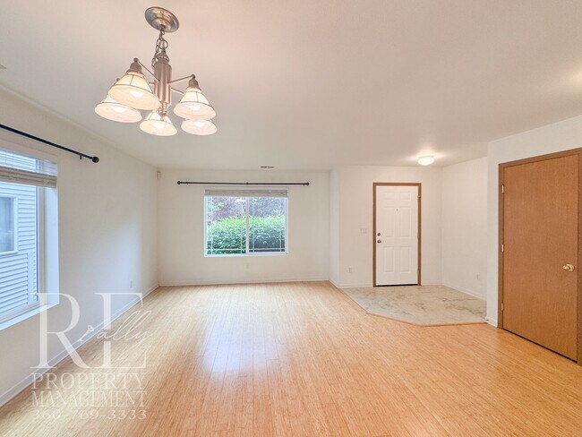 Photo - Spacious 4-Bedroom Home with Brand-New Carpet, Two Living Areas & Loft