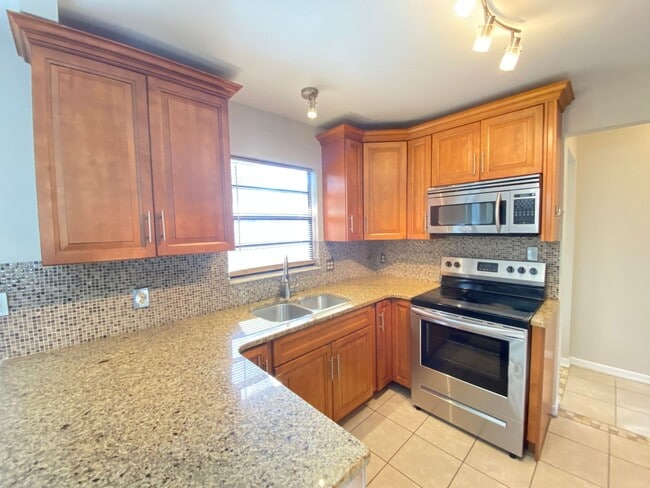 Photo - 2/2 home with garage - tile on inside with...