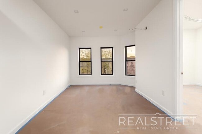 Photo - Stylish 1-Bedroom Apartment with Modern Amenities in Bed-Stuy