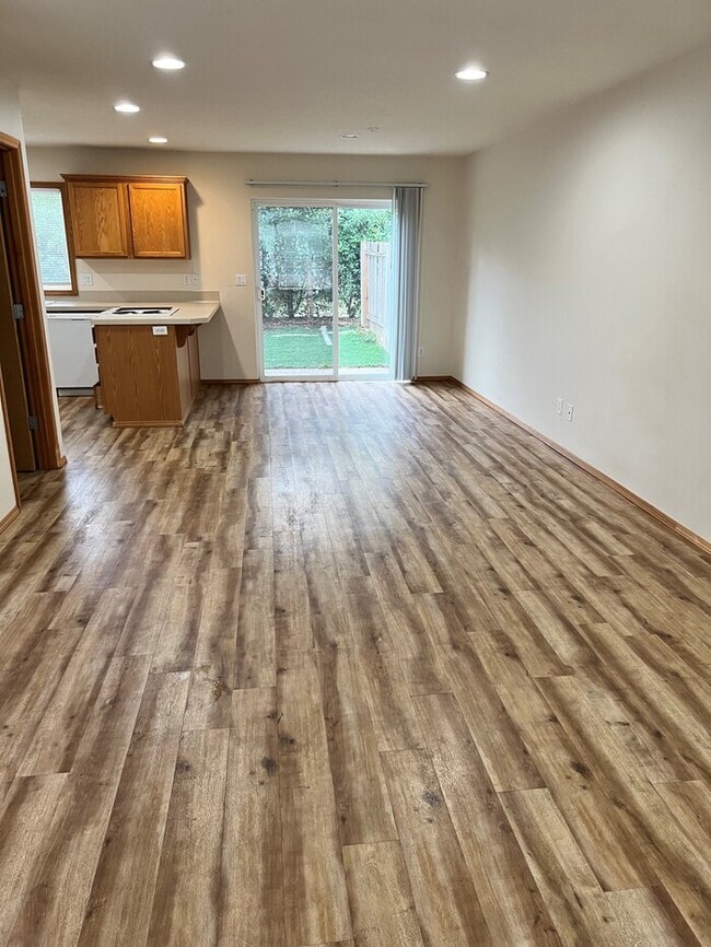 Photo - Beautiful Home with LVP Flooring, W/D, Garage, Back Yard, and MORE!