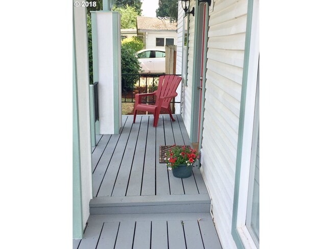 Photo - Charming Two-Story 3-Bedroom Residence Featuring Hardwood Floors, Modern Kitchen, and Outdoor Deck