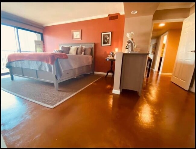 Large master bedroom with remote control blackout blinds - 500 N St Unit 1508