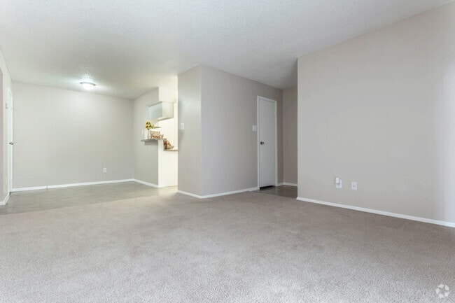 Living Room, Dining Room, and Kitchen - Madison at Bear Creek Apartments