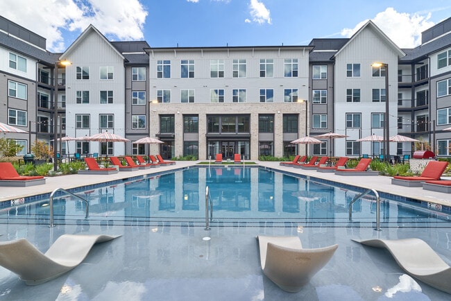 Resort-style Swimming Pool with Tanning Ledge and Sundeck