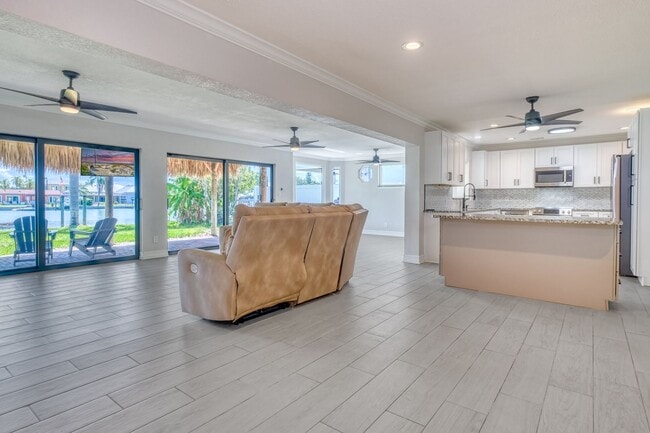 Photo - Treasure Island Three Bedroom, Two Bath Furnished Single Family Home on the water.