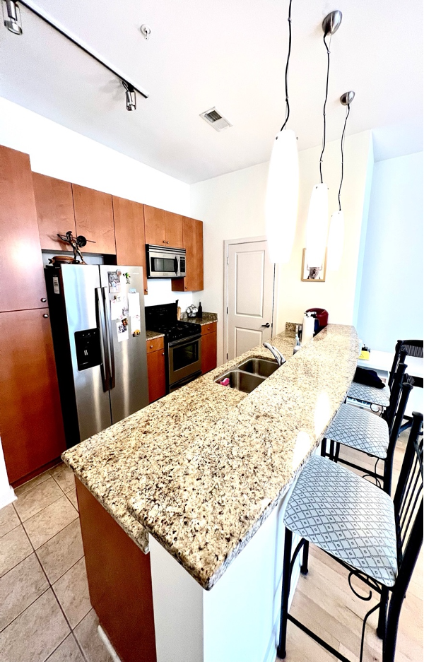 Kitchen Granite top counters - 1209 N Charles St Unit 316