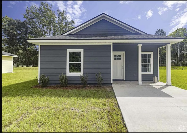 Building Photo - Welcome to this charming home located in t...
