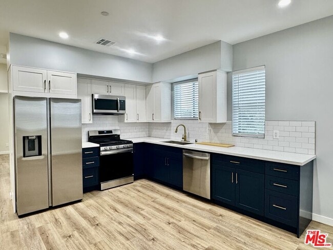 Building Photo - 5635 Homeside Ave Unit 5637 1/2