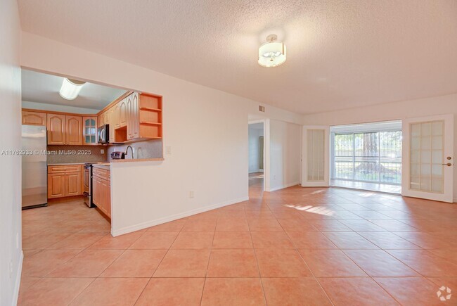 Building Photo - 9170 Fontainebleau Blvd Unit 105 Rental