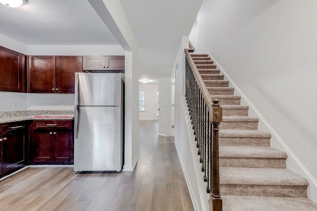 Photo - Spacious 3BR Townhome with Main-Level Primary Suite