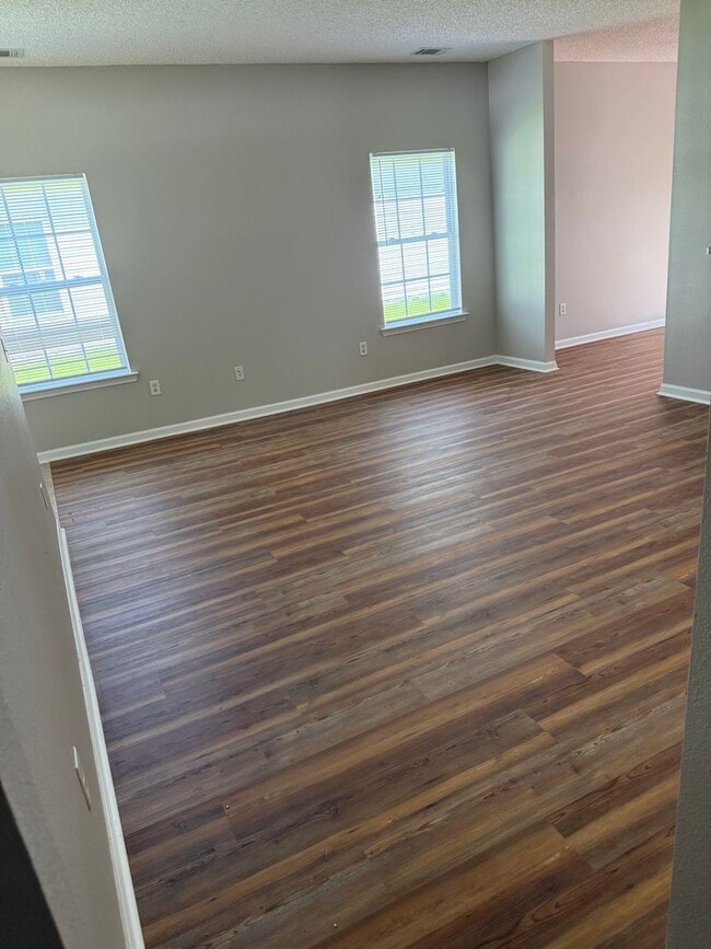 Photo - New floors, just painted, and all new appliances!!