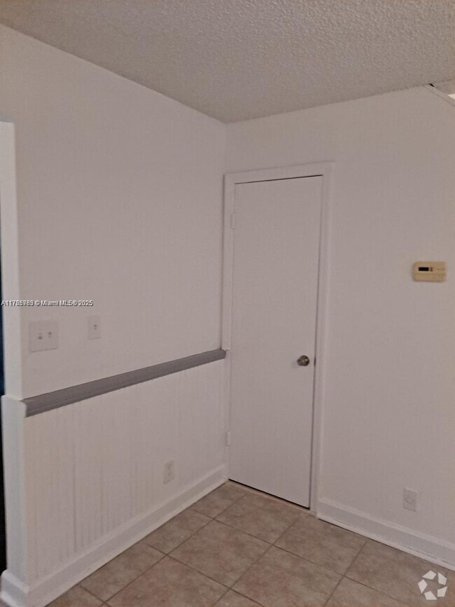 Building Photo - 6627 Winfield Blvd Unit 105-C Rental