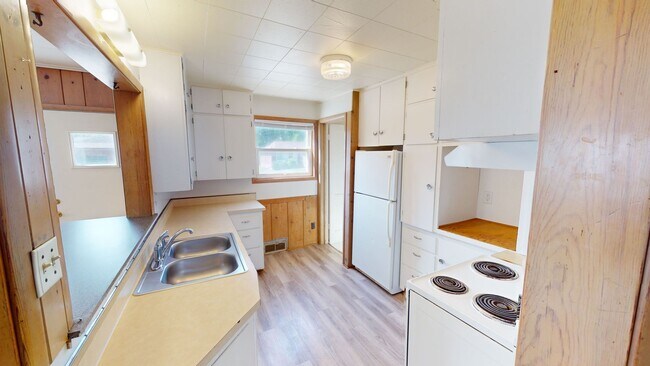 Photo - 4 Bedroom House Available August 1st, 2026