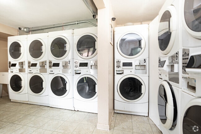 On-site Laundry room - Centennial Gardens