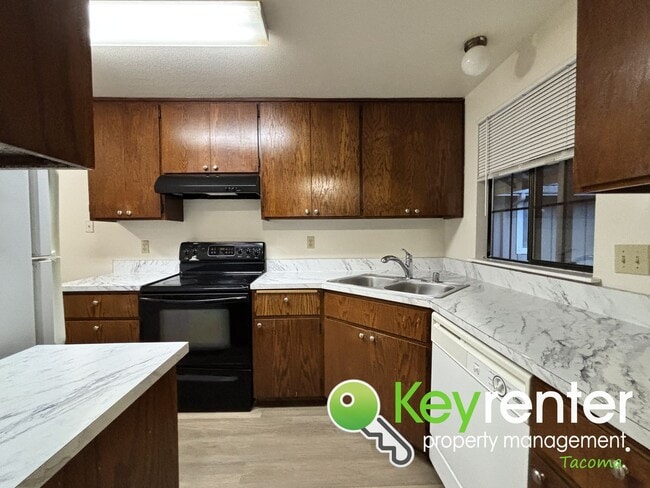 Photo - Comfortable Upstairs 2 Bedroom 2 Bath Rental in Private Community Near Fircrest!