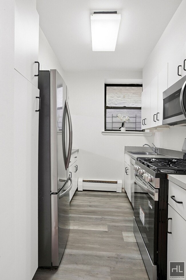 Photo - Steps to Central Park & Subways: Massive Kingsize 1BR at St Nicholas Court Condominium Unit 4E