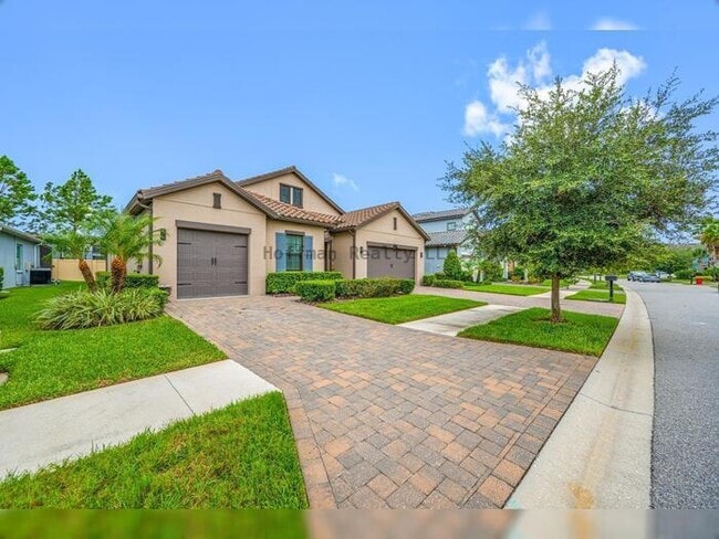 Photo - Luxury 4-Bedroom Home with 3-Car Garage in Gated Promenade at LakePark