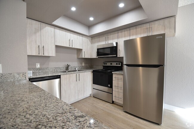 Building Photo - Stunningly remodeled 2-bedroom, 2-bath con... Unit 202 Rental