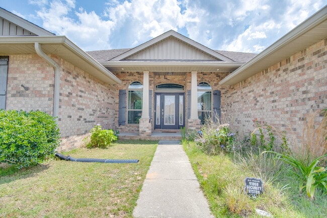 Photo - Milton 4BR Pool Home with Office, Vaulted Ceilings, Screened Saltwater Pool & 2-Car Garage