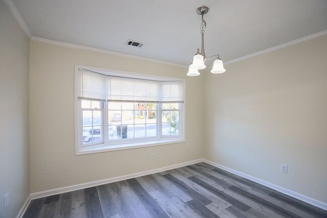 Photo - 2BR/2.5BA Townhome Gem with Fenced Yard, Fireplace & Bay Windows
