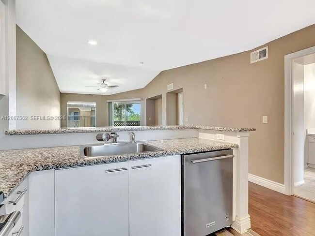 Building Photo - 4847 Via Palm Lakes Unit 1021