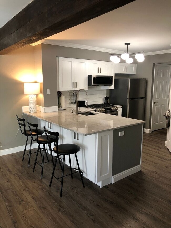 Photo - Luxury 2 Bed 1 Bath Condo w/ ATTACHED GARAGE Unit A