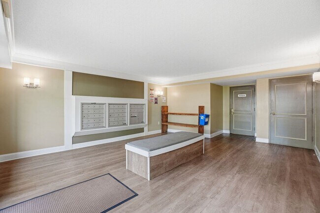 Photo - This expansive ground level residence is set within a serene, gated garden community surrounded b...