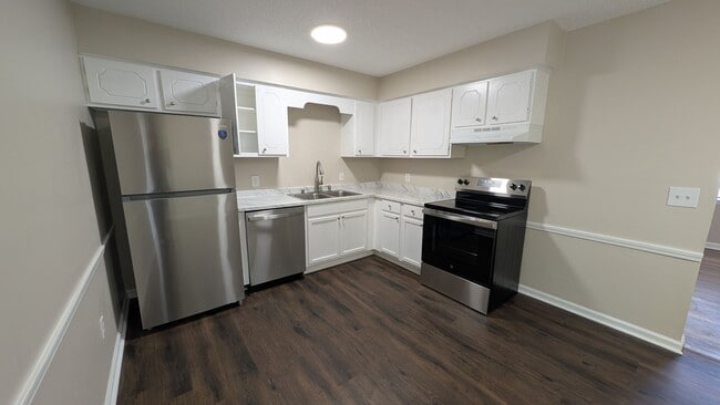 Photo - Fenced Yard, Lots of Light, Hard Floors Throughout