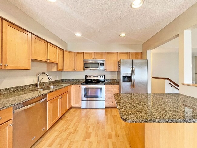 Photo - Beautifully Redone Modern Townhome with Large Deck, 2-Car Garage, Granite Kitchen, Vaulted Ceilin...