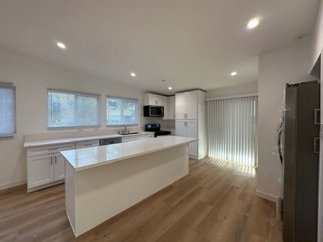 Photo - Completely remodeled 4+2 sprawled across a...