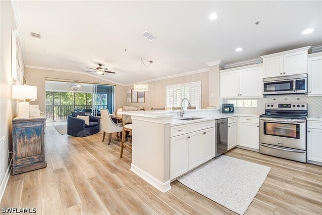 Building Photo - 975 Tarpon Cove Dr Unit 204