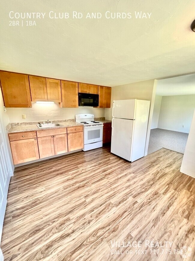 Building Photo - 671 Country Club Rd Unit F Rental