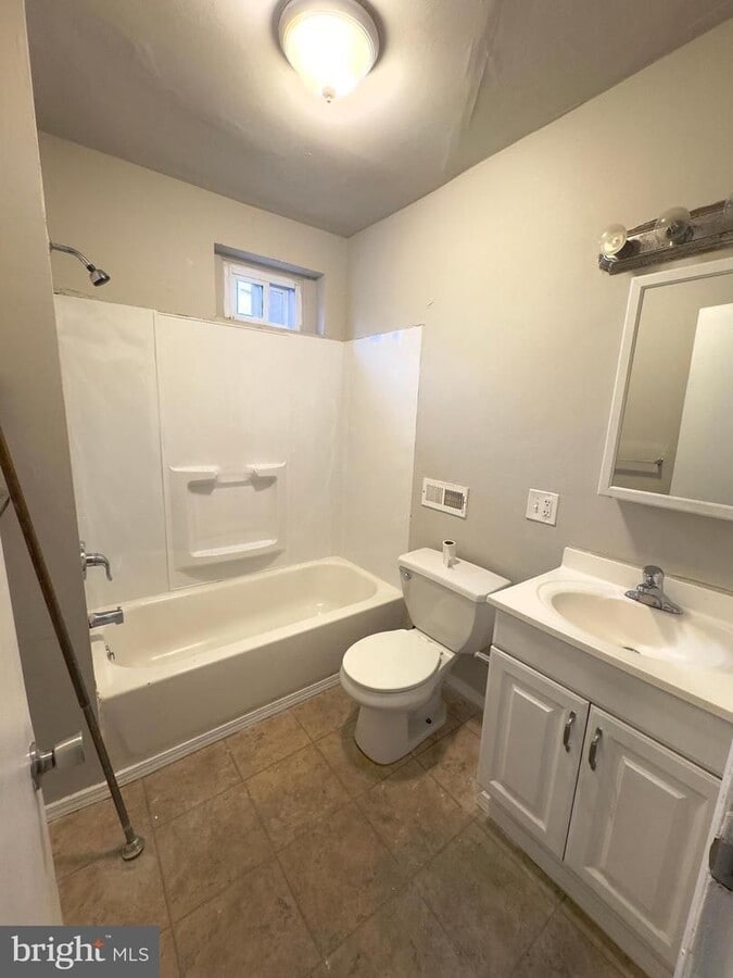 Photo - Spacious 5-Bedroom Home with Private Yard & Off-Street Parking in Upland