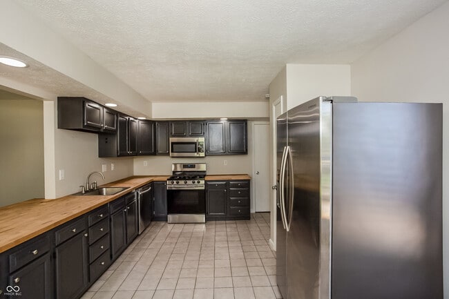 Photo - 9033 E 12th St