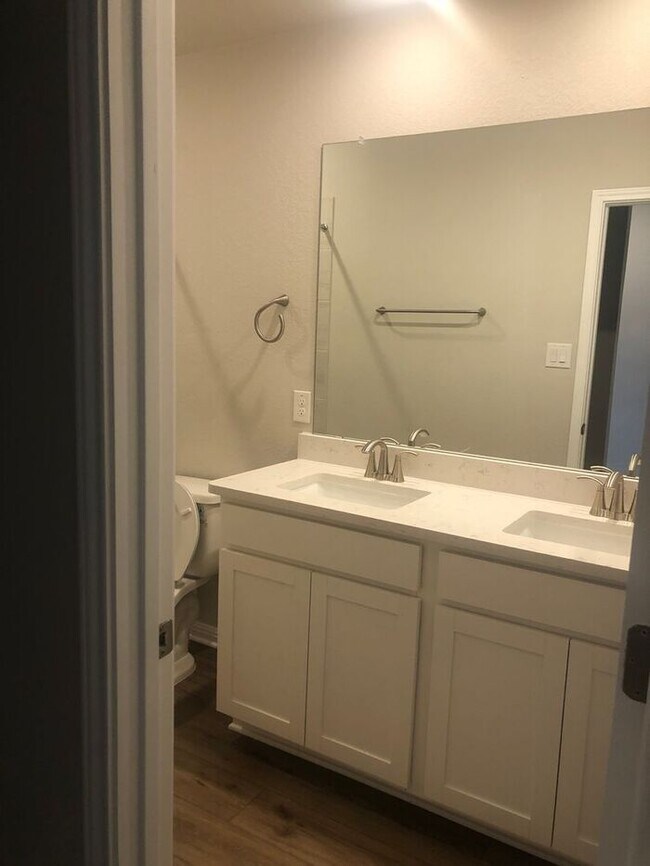 Photo - -=Available April 2026=-  4BR/2BA w/ Fenced Yard + Covered Parking in Hutto, TX