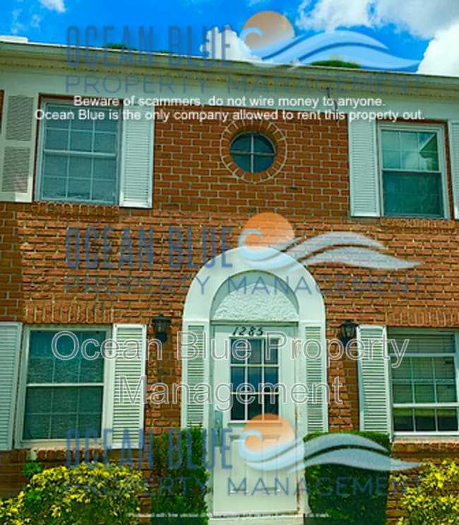 Building Photo - 1285 85th Terrace N Unit C