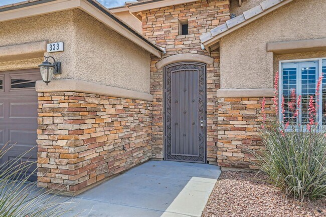 Photo - Gorgeous 5 bd, 3 1/2 bath, 3 car in gated community with strip and mountain views!