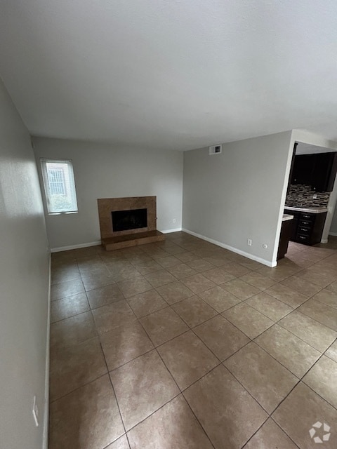 Living Room and Kitchen - 6560 College Grove Dr Unit #75 Rental