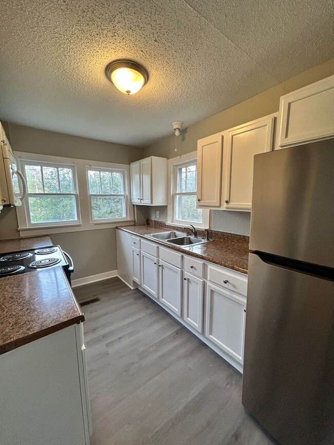 Photo - Charming 2 Bed, 1 Bath, Attached Carport and Spacious Yard!